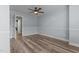 Bedroom featuring hardwood floors, soft color palette and natural lighting at 170 Homestead Rd, Angier, NC 27501