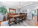 Cozy dining room featuring a wooden table, stylish chairs, and elegant decor at 170 Homestead Rd, Angier, NC 27501