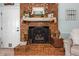 Close up of the brick fireplace with rustic decorations at 170 Homestead Rd, Angier, NC 27501