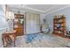 Cozy living room features hardwood floors, stylish furnishings, and a unique storage unit at 170 Homestead Rd, Angier, NC 27501
