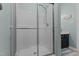 Modern shower with glass enclosure, a rainfall showerhead and sleek fixtures at 170 Homestead Rd, Angier, NC 27501