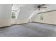 Spacious bedroom with vaulted ceilings, carpet, and natural lighting at 1705 Bridgeport Dr, Raleigh, NC 27615