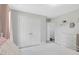 Charming bedroom with a neutral color scheme, a closet, and a dresser for storage at 1826 Heisser Ln, Fuquay Varina, NC 27526