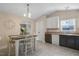 Inviting eat-in kitchen area with modern light fixture at 1826 Heisser Ln, Fuquay Varina, NC 27526