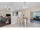 Cozy dining area adjacent to the living room and kitchen, perfect for entertaining at 1826 Heisser Ln, Fuquay Varina, NC 27526