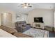 Cozy living room with vaulted ceilings, ceiling fan, and comfortable seating at 1826 Heisser Ln, Fuquay Varina, NC 27526