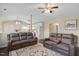 Open-concept living area connects to a modern kitchen, creating an inviting space at 1826 Heisser Ln, Fuquay Varina, NC 27526