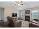 Inviting living room features a fireplace and media console, perfect for relaxation at 1826 Heisser Ln, Fuquay Varina, NC 27526