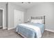 Comfortable bedroom features a ceiling fan, neutral walls, and carpet flooring at 1840 Willie Pace Rd, Burlington, NC 27217