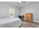 Inviting bedroom with a ceiling fan and great natural light from the window at 1840 Willie Pace Rd, Burlington, NC 27217