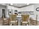 Eat-in kitchen boasting granite countertops, stainless steel appliances, and shaker cabinets at 1840 Willie Pace Rd, Burlington, NC 27217
