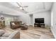 Spacious living room featuring modern hardwood floors, comfortable seating, and abundant natural light at 1840 Willie Pace Rd, Burlington, NC 27217