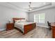 Primary bedroom features a trey ceiling, ceiling fan, and hardwood floors at 1840 Willie Pace Rd, Burlington, NC 27217