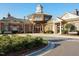 Charming brick clubhouse with a unique tower, arched entryway, and well-maintained landscaping at 1909 Whirlaway Ct., Cary, NC 27519