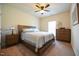Neutral bedroom with carpet, ceiling fan, and natural light from the window at 197 W Paige Wynd Dr, Angier, NC 27501