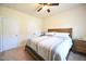 This bedroom features neutral walls, a ceiling fan and carpet at 197 W Paige Wynd Dr, Angier, NC 27501