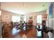 Bright dining room with hardwood floors, a chandelier, and plenty of seating at 197 W Paige Wynd Dr, Angier, NC 27501