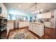 Spacious kitchen with white cabinetry, granite countertops, and stainless steel appliances at 197 W Paige Wynd Dr, Angier, NC 27501
