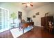 Spacious home office with hardwood floors and a ceiling fan at 197 W Paige Wynd Dr, Angier, NC 27501