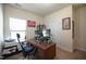 This office features neutral walls and carpet at 197 W Paige Wynd Dr, Angier, NC 27501