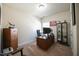 This office features neutral walls and carpet at 197 W Paige Wynd Dr, Angier, NC 27501