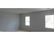 This is an alternative view of the bedroom windows with blinds at 202 Redstone Ct, Gibsonville, NC 27249