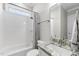 Bathroom featuring modern sink, tile accents, and a shower-tub combination at 2086 Amalfi Pl, Apex, NC 27502