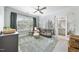 Bedroom featuring leafy wallpaper and a view of the bathroom at 2086 Amalfi Pl, Apex, NC 27502