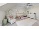 Bright bedroom showcasing fun wallpaper and a comfy armchair at 2086 Amalfi Pl, Apex, NC 27502