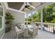 Inviting screened porch with outdoor furniture and backyard views at 2086 Amalfi Pl, Apex, NC 27502
