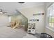 Bright playroom with climbing toys, a kitchen, and room for imaginative play at 2086 Amalfi Pl, Apex, NC 27502