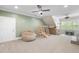 Large playroom with natural light, seating, climbing toys, and playful design elements at 2086 Amalfi Pl, Apex, NC 27502
