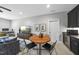 Recreation room showcasing a table and chairs, TV, and wet bar that's perfect for relaxation and entertainment at 209 Preston Retreat Ln, Cary, NC 27513