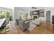 Cozy living room featuring a fireplace, built-in shelving, and plush seating at 209 Preston Retreat Ln, Cary, NC 27513