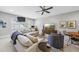 Comfortable living room featuring a large sectional sofa, a coffee table, and a TV at 209 Preston Retreat Ln, Cary, NC 27513