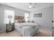 Bedroom features a queen bed, two side tables and neutral walls at 210 Presidents Walk Ln, Cary, NC 27519