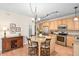 Charming kitchen boasts a granite island, stainless steel appliances, and ample counter space at 210 Presidents Walk Ln, Cary, NC 27519