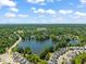 Stunning aerial view of a community, showcasing its lake and lush green surroundings at 2105 Metacomet Way, Raleigh, NC 27604