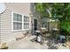 Backyard featuring a grill on the concrete patio and a fenced yard with plenty of shade at 2105 Metacomet Way, Raleigh, NC 27604