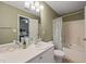 Well-maintained bathroom with a single sink, shower, and bath combination at 2105 Metacomet Way, Raleigh, NC 27604