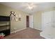 This bedroom has neutral walls, standard closet, fan, and multiple pieces of decor at 2105 Metacomet Way, Raleigh, NC 27604