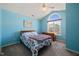 Bright bedroom with vaulted ceilings and a large window overlooking the neighborhood at 2105 Metacomet Way, Raleigh, NC 27604
