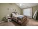 Charming bedroom with neutral walls, carpet floors, and comfortable furnishings at 2105 Metacomet Way, Raleigh, NC 27604