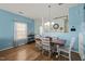 Dining area featuring hardwood floors and open access to the kitchen, perfect for entertaining at 2105 Metacomet Way, Raleigh, NC 27604