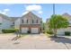 Charming two-story home with a brick facade, two-car garage, and well-manicured lawn at 2105 Metacomet Way, Raleigh, NC 27604
