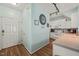 Cozy kitchen with white cabinets, hardwood floors, and modern appliances, creating a warm atmosphere at 2105 Metacomet Way, Raleigh, NC 27604