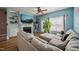 Comfortable living room showcasing a sectional sofa, fireplace, and built-in shelving at 2105 Metacomet Way, Raleigh, NC 27604