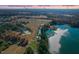 Aerial view of the neighborhood near a lake. Conveniently located to Fort Bragg and Fayetteville airport at 215 Collins Rd, Lillington, NC 27546