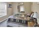 Bedroom with a comfortable bed, large mirror, and decor on the walls and dresser at 215 Collins Rd, Lillington, NC 27546