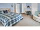 Spacious bedroom with a comfortable bed and extra seating, perfect for relaxing and unwinding at 215 Collins Rd, Lillington, NC 27546
